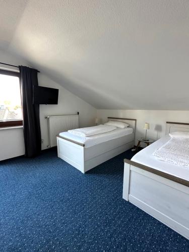 2_zimmer_5_einzelbetten